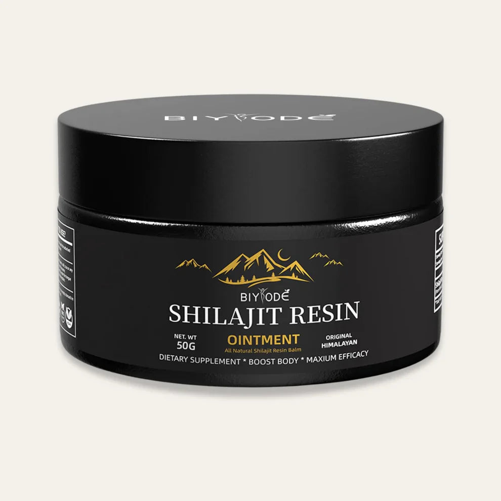 Pure Himalayan Shilajit resin in glass jar with golden spoon – premium quality organic supplement